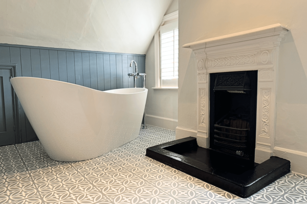 Bathroom Renovation with fireplace in Lingfield Surrey by Mode Construction Group Local Builders covering Surrey, Sussex, Kent